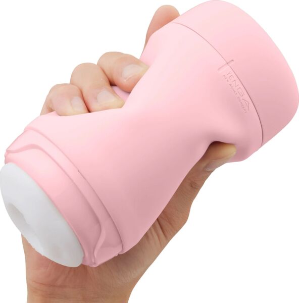 Masturbatore Tenga Puffy Strawberry Pink, di colore rosa fragola, con il suo tappo