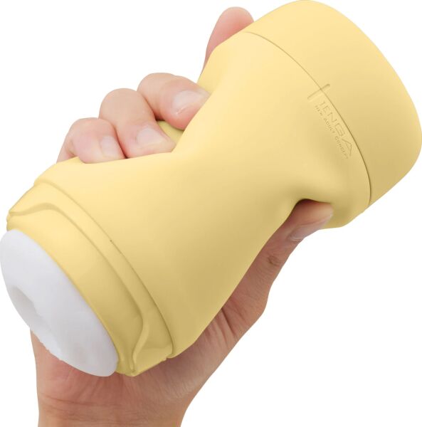 Masturbatore Tenga Puffy Custard Yellow, di colore giallo, con il suo coperchio